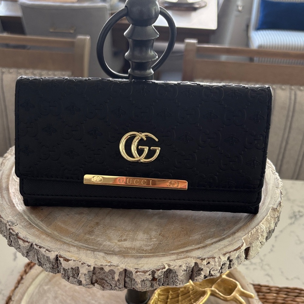 Elegant Black Wallet with Gold Details
